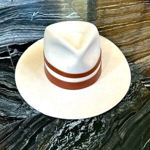 Lightly worn Janessa Leone cream hat